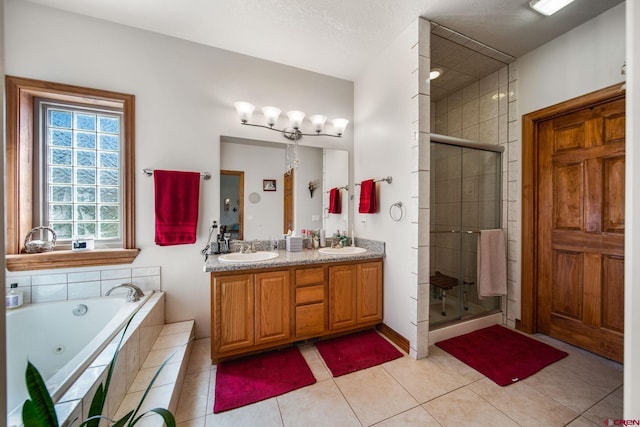 500 Dove Ranch Rd, Bayfield, CO 81122 - bathroom with a jetted tub, a sink, and a stall shower