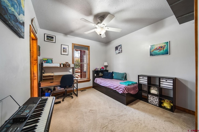 500 Dove Ranch Rd, Bayfield, CO 81122 - bedroom featuring carpet floors, baseboards, a ceiling fan, and a textured ceiling