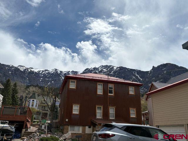 231 3rd Ave, Ouray, CO 81427 - view of property exterior with a mountain view