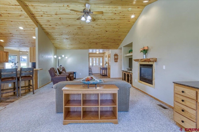 26 Steamboat Dr, Pagosa Springs, CO 81147 - dining room with ceiling fan, light colored carpet, a glass covered fireplace, recessed lighting, and wood ceiling
