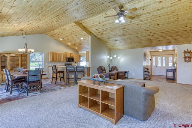 26 Steamboat Dr, Pagosa Springs, CO 81147 - living room featuring wooden ceiling, carpet, ceiling fan with notable chandelier, and high vaulted ceiling