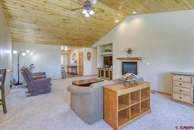 26 Steamboat Dr, Pagosa Springs, CO 81147 - living room featuring baseboards, carpet, a glass covered fireplace, and wooden ceiling
