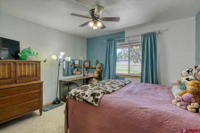 26 Steamboat Dr, Pagosa Springs, CO 81147 - bedroom with baseboards, ceiling fan, and light carpet