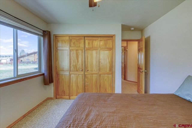 26 Steamboat Dr, Pagosa Springs, CO 81147 - carpeted bedroom featuring baseboards, ceiling fan, and a closet