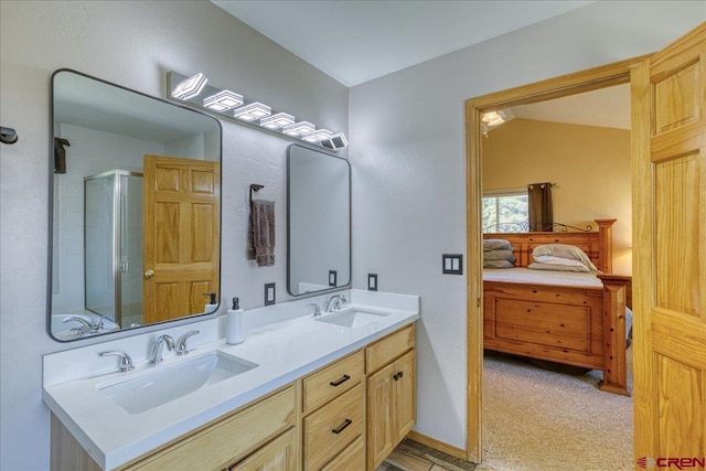 26 Steamboat Dr, Pagosa Springs, CO 81147 - full bath featuring a sink, ensuite bath, an enclosed shower, and double vanity