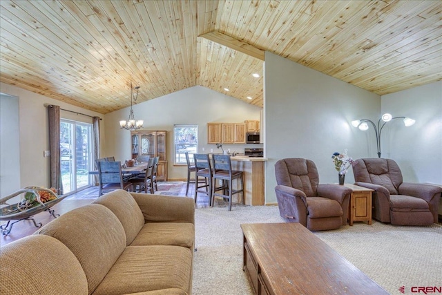 26 Steamboat Dr, Pagosa Springs, CO 81147 - living area featuring vaulted ceiling, wooden ceiling, a notable chandelier, and light colored carpet