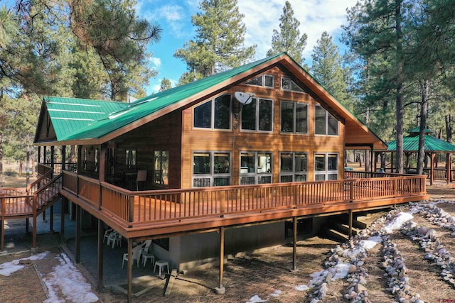 1215 Beaver Creek Dr, Bayfield, CO 81122 - rear view of property featuring a deck and metal roof