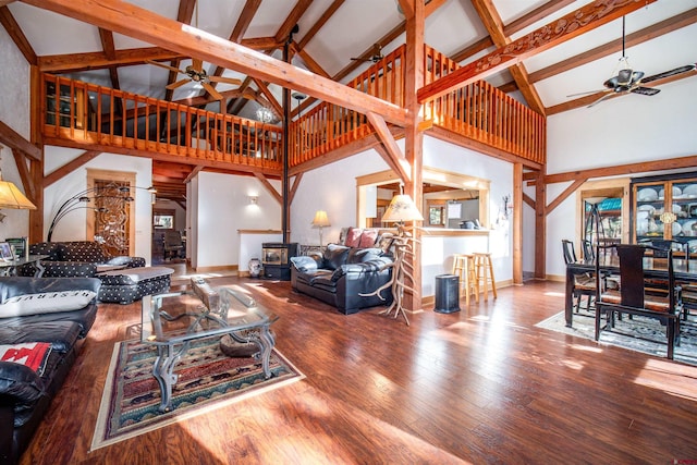 1215 Beaver Creek Dr, Bayfield, CO 81122 - living room featuring ceiling fan, wood finished floors, and high vaulted ceiling