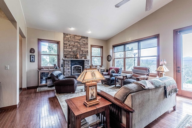 35900 Rd J.8, Mancos, CO 81328 - living room featuring lofted ceiling, hardwood / wood-style flooring, baseboards, a fireplace, and a ceiling fan