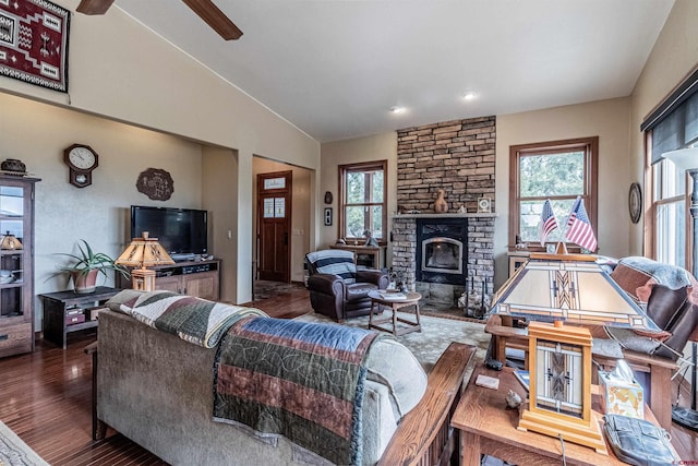 35900 Rd J.8, Mancos, CO 81328 - living room featuring plenty of natural light, vaulted ceiling, wood finished floors, recessed lighting, and a fireplace