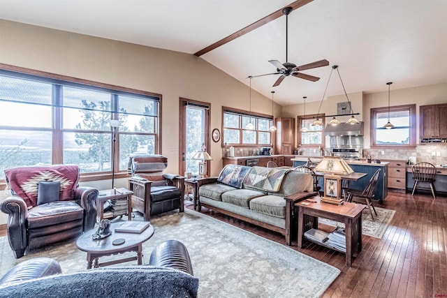 35900 Rd J.8, Mancos, CO 81328 - living area featuring dark wood-style flooring, vaulted ceiling, and a ceiling fan