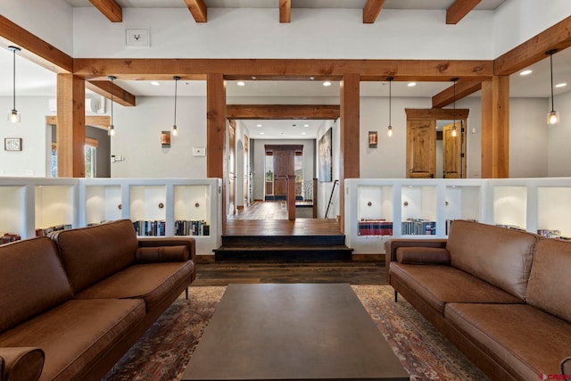 living area with recessed lighting, beamed ceiling, and wood finished floors