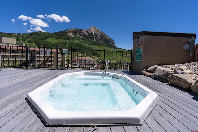 40 Marcellina Ln Unit 16, Mount Crested Butte, CO 81225 - view of swimming pool featuring a deck with mountain view and hot tub deck surround