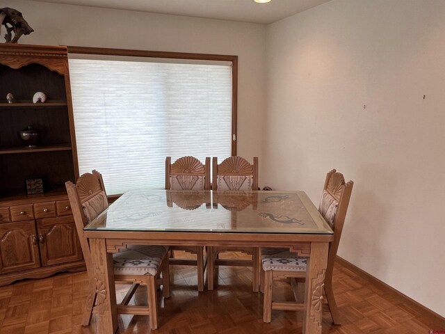dining space with baseboards