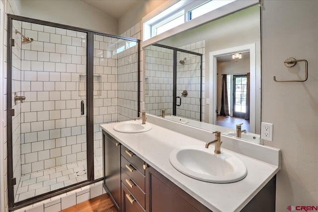 474 Lakewood St, Pagosa Springs, CO 81147 - bathroom featuring a sink, a stall shower, and double vanity