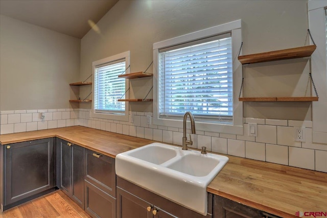 474 Lakewood St, Pagosa Springs, CO 81147 - kitchen featuring a sink, open shelves, and wooden counters