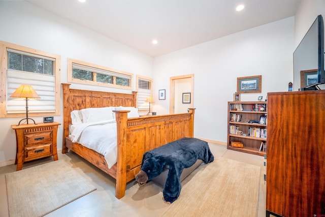 bedroom featuring recessed lighting and baseboards