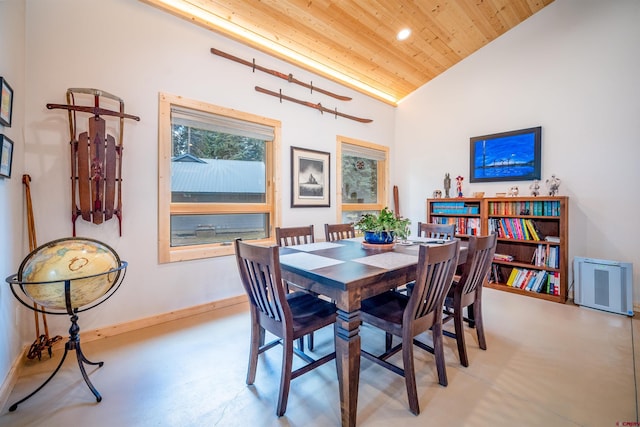 dining room with wood ceiling, finished concrete flooring, vaulted ceiling, baseboards, and recessed lighting