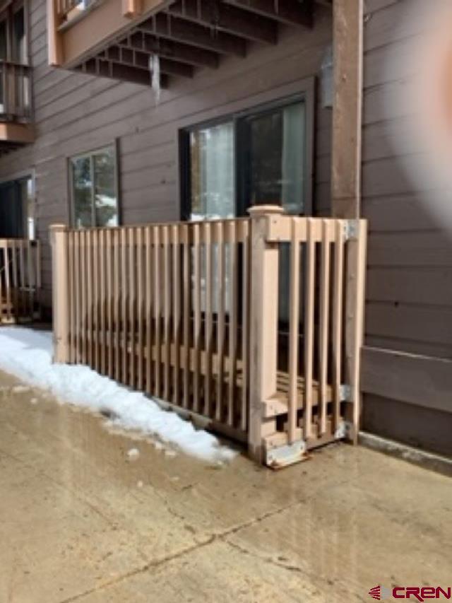 view of side of property with fence