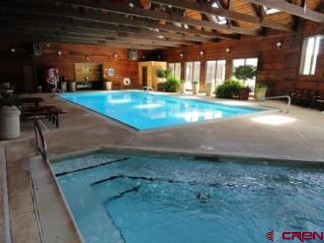 pool featuring a patio area