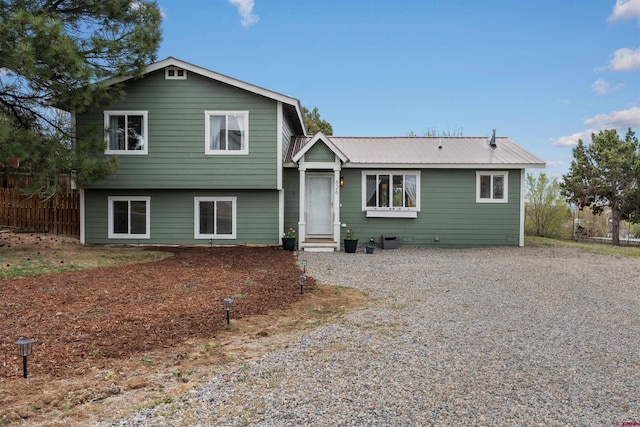 826 E Tamarack Dr, Bayfield, CO 81122 - tri-level home with metal roof and entry steps
