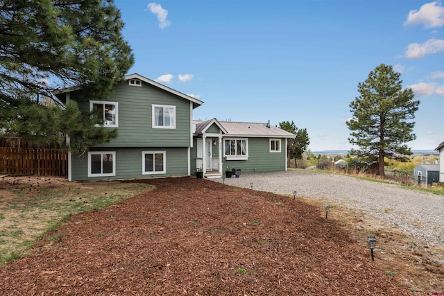 826 E Tamarack Dr, Bayfield, CO 81122 - view of front facade with fence and driveway