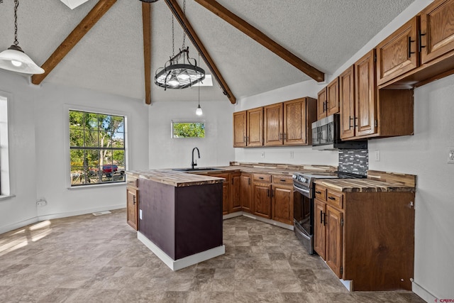 319 Rosevale Rd, Grand Junction, CO 81507 - kitchen with a sink, appliances with stainless steel finishes, wooden counters, and a textured ceiling