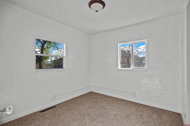 319 Rosevale Rd, Grand Junction, CO 81507 - unfurnished room featuring baseboards, visible vents, and carpet