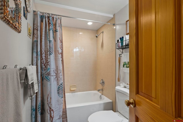 bathroom featuring toilet and shower / tub combo with curtain