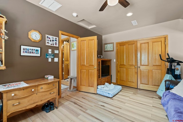 bedroom featuring visible vents, a ceiling fan, and light wood-type flooring