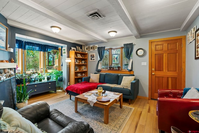 living room featuring visible vents, light wood-style floors, beam ceiling, and wood ceiling