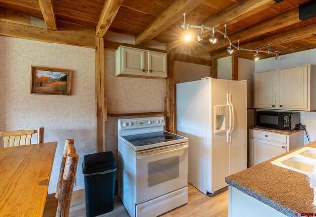 kitchen featuring track lighting, light wood finished floors, white appliances, wooden ceiling, and beamed ceiling