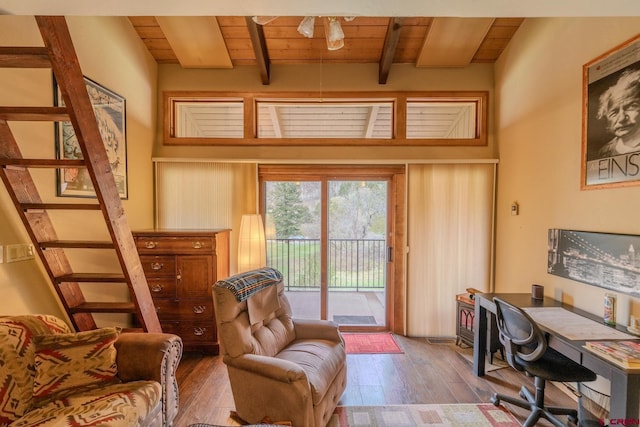 home office featuring beamed ceiling, wooden ceiling, and hardwood / wood-style floors