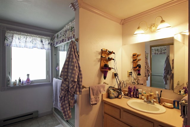 full bathroom featuring vanity, ornamental molding, baseboard heating, and a shower