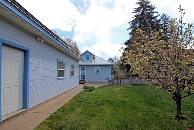 view of yard with a patio and fence
