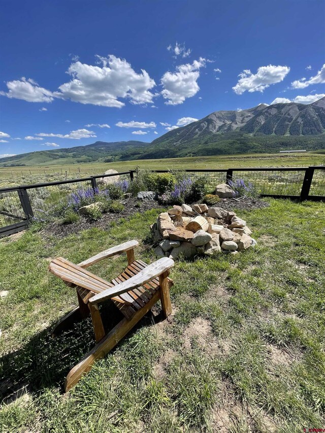 view of mountain feature with a rural view