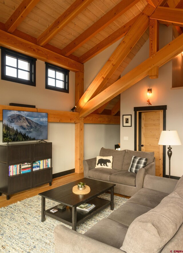 96 Chestnut Ln, Crested Butte, CO 81224 - living room with wood ceiling, high vaulted ceiling, beam ceiling, and wood finished floors