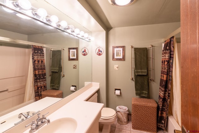 314 N Tamarron Dr Unit 215, Durango, CO 81301 - bathroom with vanity, tile patterned floors, shower / bath combination with curtain, and toilet