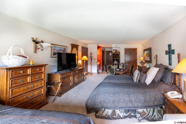 314 N Tamarron Dr Unit 215, Durango, CO 81301 - bedroom featuring carpet floors