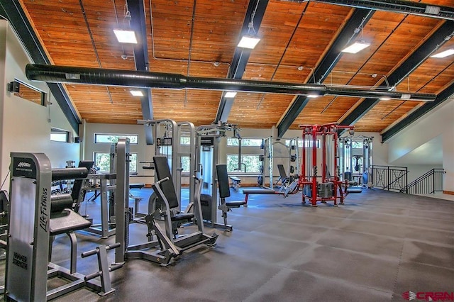 workout area featuring wooden ceiling and lofted ceiling