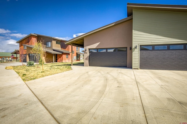2785 Rock Rd Unit A, Pagosa Springs, CO 81147 - view of front facade with a garage and concrete driveway