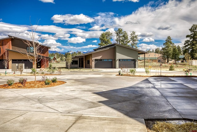 2785 Rock Rd Unit A, Pagosa Springs, CO 81147 - view of front of property featuring an attached garage and driveway