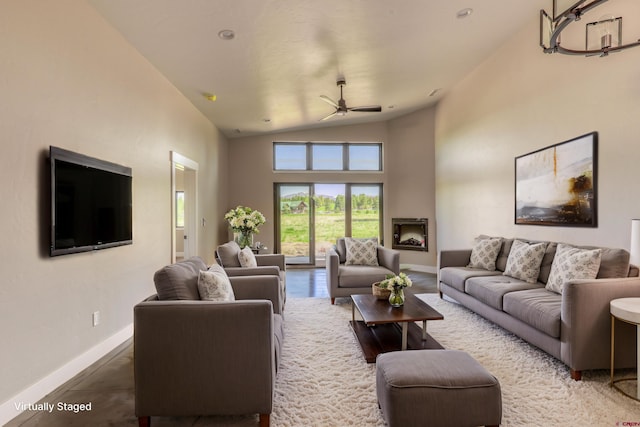 2785 Rock Rd Unit A, Pagosa Springs, CO 81147 - living room with baseboards, a ceiling fan, and lofted ceiling