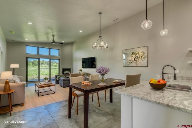 2785 Rock Rd Unit A, Pagosa Springs, CO 81147 - dining space featuring high vaulted ceiling and ceiling fan
