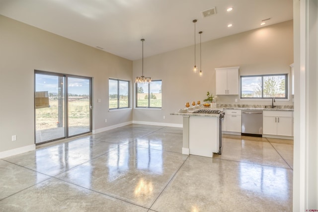 kitchen featuring baseboards, a high ceiling, white cabinets, finished concrete floors, and dishwasher
