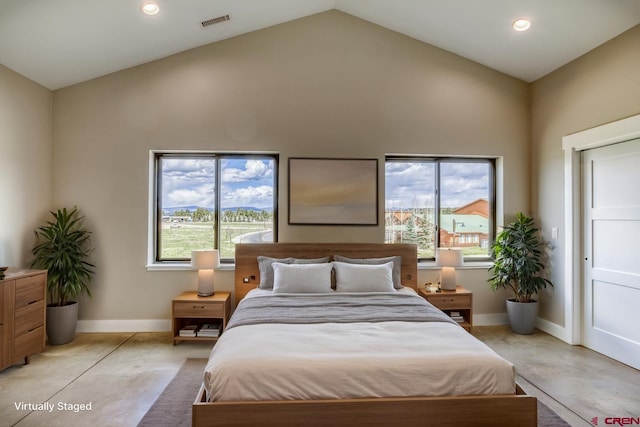 bedroom featuring visible vents, baseboards, and high vaulted ceiling