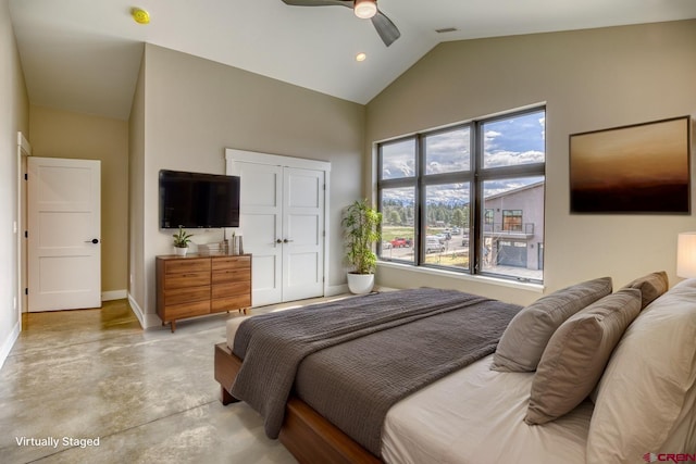 bedroom with ceiling fan, high vaulted ceiling, baseboards, finished concrete floors, and a closet