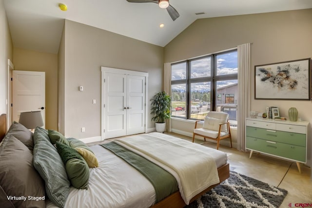 bedroom with ceiling fan, high vaulted ceiling, baseboards, visible vents, and a closet
