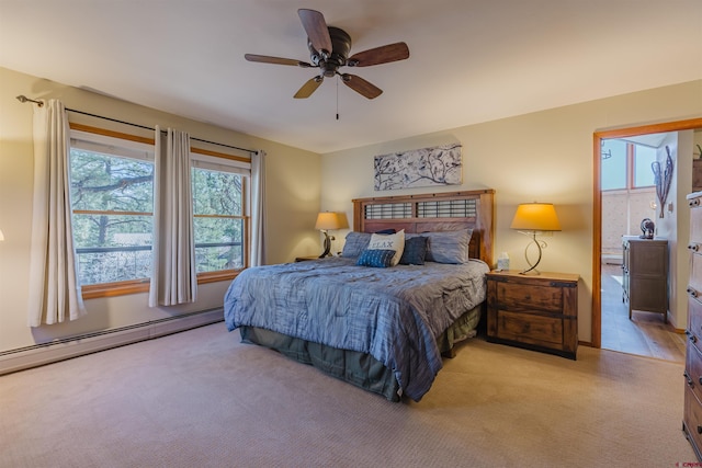 bedroom with ceiling fan, light carpet, and baseboard heating