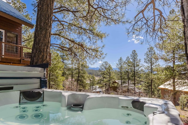 exterior details featuring a hot tub